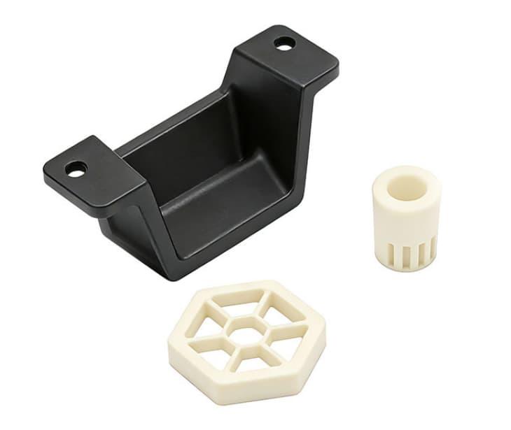 On-demand manufacturing parts including CNC machined metal brackets and 3D printed plastic components