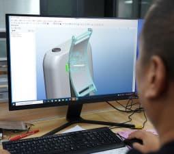 Renewable design experts reviewing clean energy components