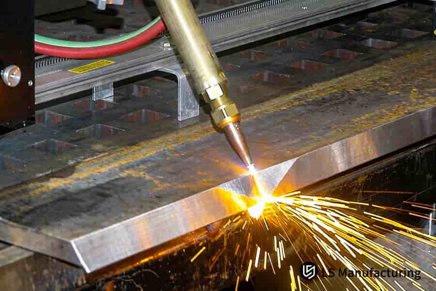 An automated beveling head machines a steel pipe end, the key welding preparation services for structural joints.
