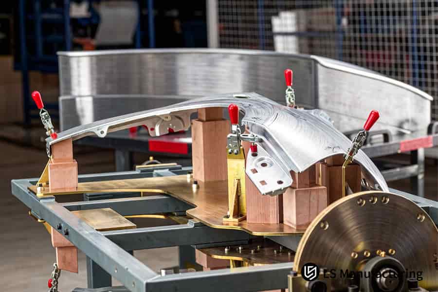 Stamping a 6061 aluminum automotive bracket for structural components in a high-volume car part stamping process.