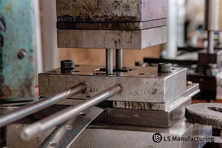 Stamping precise holes in an aluminum rod enables custom metal stamping services​ for engine mounting systems.